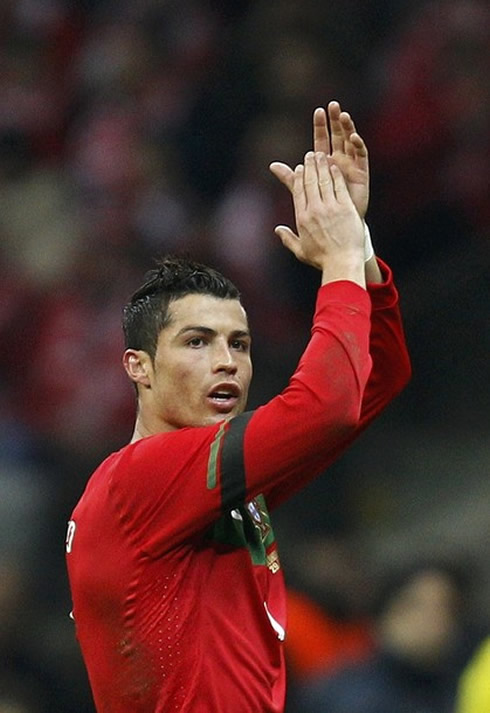 Cristiano Ronaldo applauding the Polish crowd, after being subbed by Ricardo Quaresma, in Poland vs Portugal in 2012