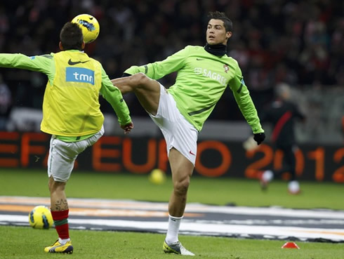 Cristiano Ronaldo doing warm-ups exercises just before Portugal takes Poland, at the Polish National Stadium, in 2012