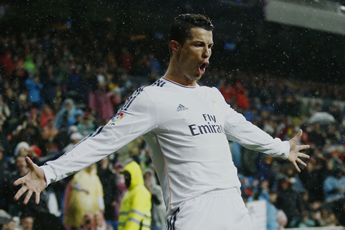 Cristiano Ronaldo arms-open goal celebration, in Real Madrid 2014