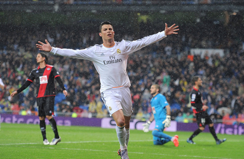 Cristiano Ronaldo running with his arms wide open, after sending Real Madrid into the lead against Rayo Vallecano