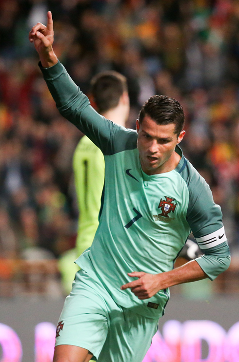 Cristiano Ronaldo puts his finger up in the air after giving Portugal a 2-goal lead against Belgium