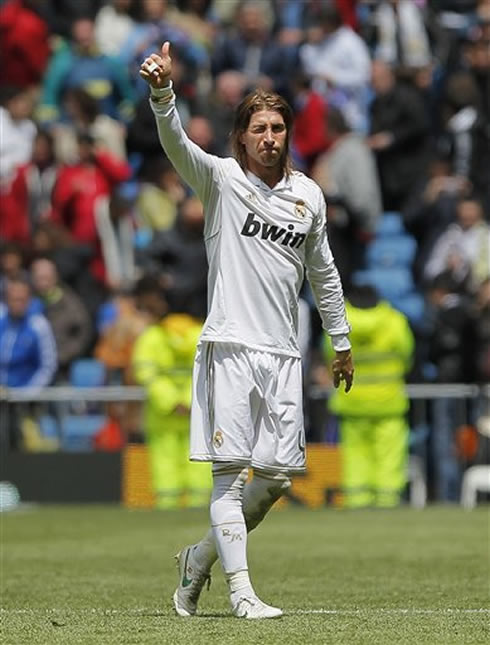 Sergio ramos with one eye closed, during a Real Madrid game for La Liga in 2012