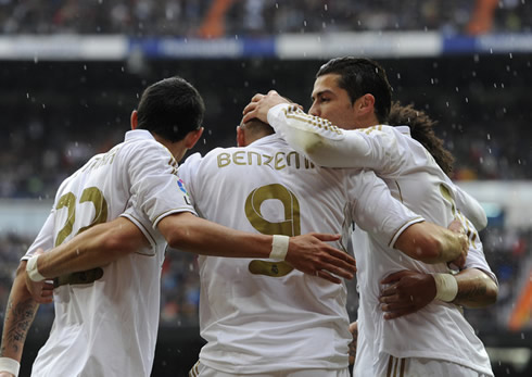 Cristiano Ronaldo kissing Benzema's head, after another goal scored for Real Madrid