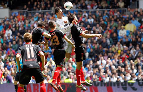 Cristiano Ronaldo jumping higher than any other player on the field, in Real Madrid vs Sevilla in 2012
