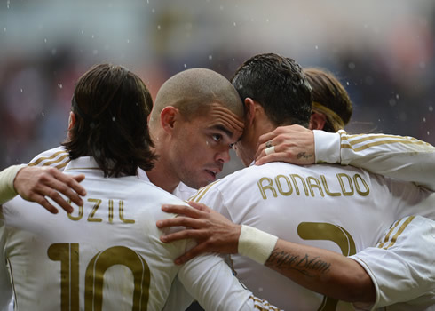 Cristiano Ronaldo receiving a tender header from Pepe, as Real Madrid celebrate the opener against Sevilla