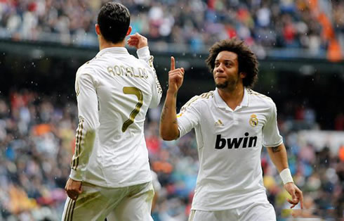 Marcelo pointing his finger to Cristiano Ronaldo, letting him know he is the best player on the field