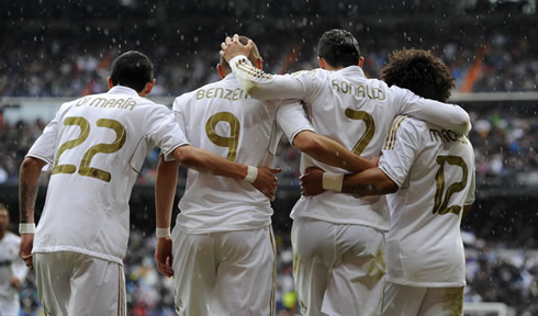Di María, Benzema, Cristiano Ronaldo and Marcelo hugging each other in Real Madrid goal celebrations in La Liga 2012