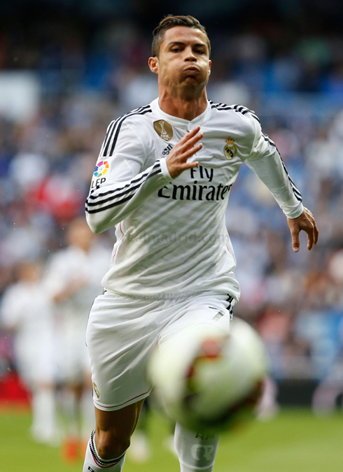 Cristiano Ronaldo chasing the ball in Real Madrid home fixture against Almeria, for the Spanish League 2015