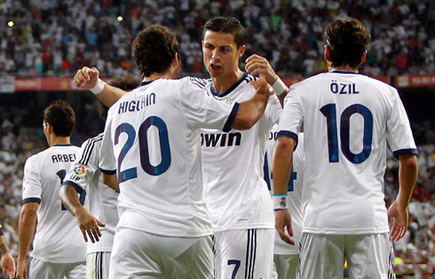 Cristiano Ronaldo hugging Gonzalo Higuaín during Real Madrid goal celebrations against Barcelona, at the Santiago Bernabéu, in 2012