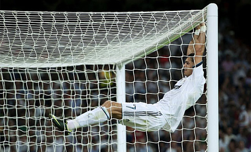 Cristiano Ronaldo hanging on the goal post, in Real Madrid vs Barcelona in 2012
