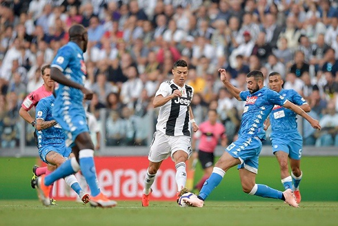 Cristiano Ronaldo getting tackled in Juventus vs Napoli in 2018