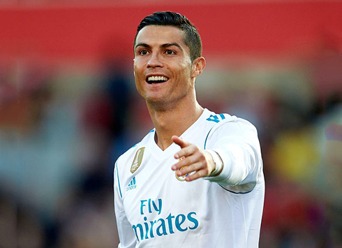 Cristiano Ronaldo smiling to his teammates