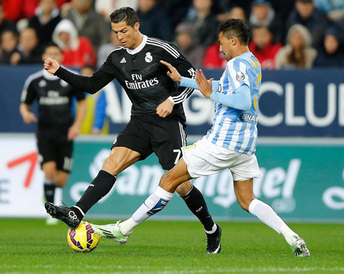 Cristiano Ronaldo doing tricks while a defender starts closing on him