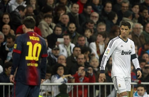 Cristiano Ronaldo looking at Lionel Messi, in Real Madrid vs Barcelona for the Copa del Rey 2012-2013
