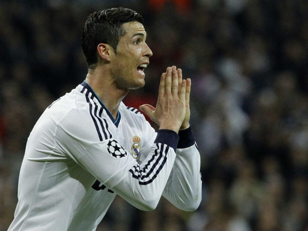 Cristiano Ronaldo praying during Real Madrid vs Borussia Dortmund, in the Champions League 2013 edition