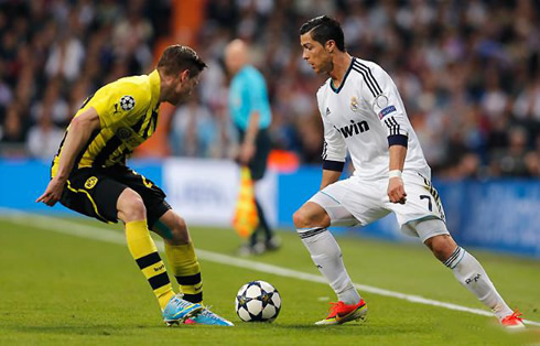 Cristiano Ronaldo cutting inside and dribbling a Borussia Dortmund defender, in the Champions League 2013