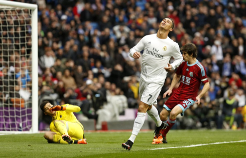 Cristiano Ronaldo closes his eyes and sends his head back, after missing a good scoring chance for Real Madrid