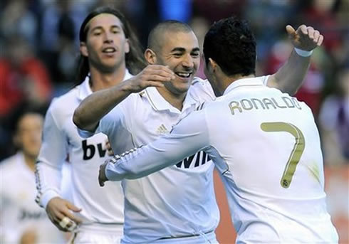 Cristiano Ronaldo preparing to hug Karim Benzema, in Real Madrid 2012
