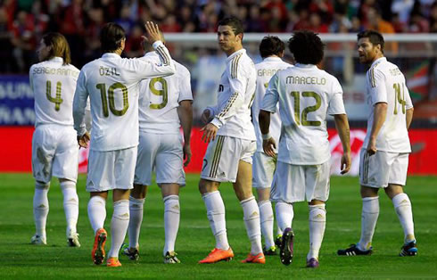 Cristiano Ronaldo with Ozil, Marcelo and Xabi Alonso, celebrating Real Madrid goal against Osasuna