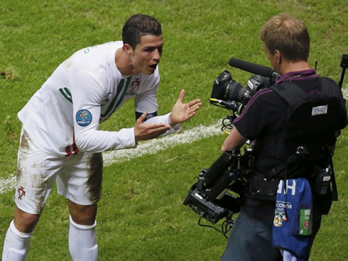 Cristiano Ronaldo dedicating his goal in the TV cameras at the EURO 2012, to his son Cristiano Ronaldo Junior, or Lionel Messi