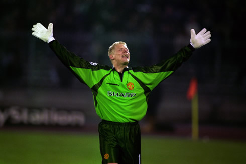 Peter Schmeichel turning to the fans with arms wide open