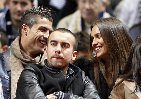 Cristiano Ronaldo and Irina Shayk, looking happy in a Real Madrid vs Barcelona game, in basketball