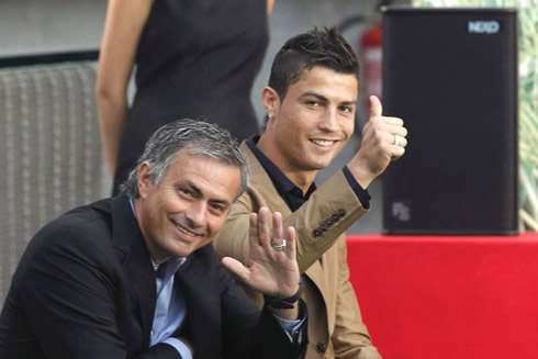 José Mourinho and Cristiano Ronaldo smiling to the cameras