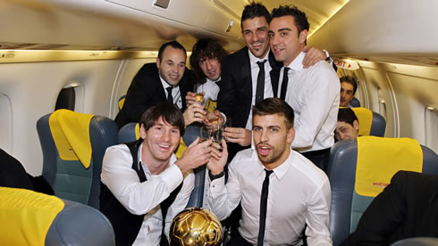 Barcelona players, Messi, Piqué, Iniesta, Puyol, David Villa and Xavi, showing FIFA Balon d'Or award