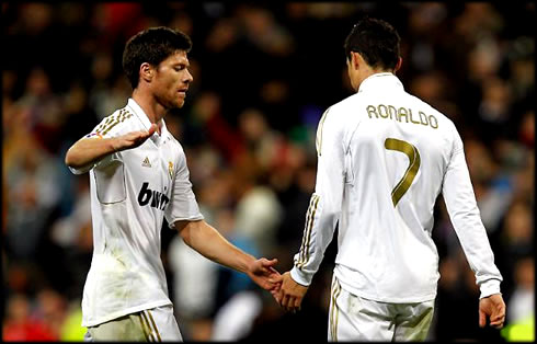 Cristiano Ronaldo unhappiness and sadness, as he gets comforted by Xabi Alonso, in a Real Madrid game in 2011-2012