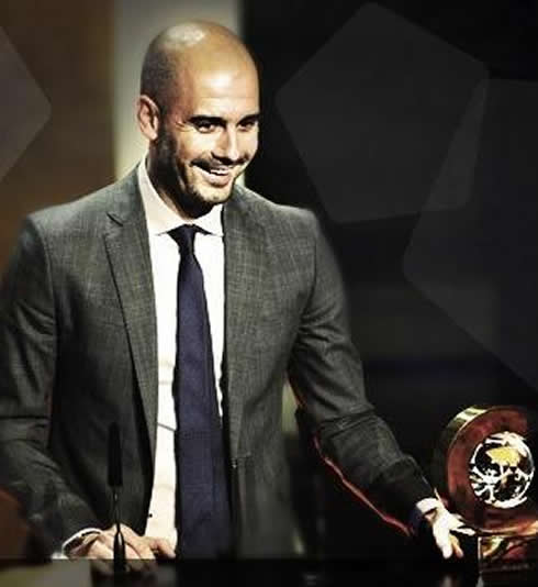 Guardiola receiving his award for Best Coach of the Year (2011)