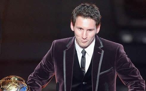 Lionel Messi looking funny and dressed as a clown, in a purple smoking at FIFA Balon d'Or 2011-2012 ceremony