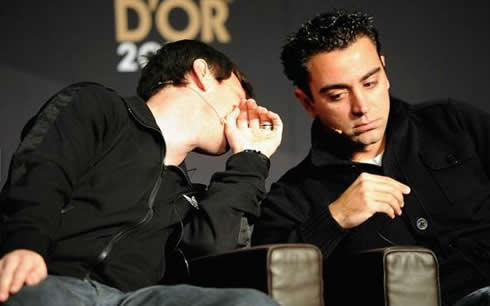 Lionel Messi and Xavi friendship, as they whisper at each other in FIFA's Balon d'Or 2011 interview