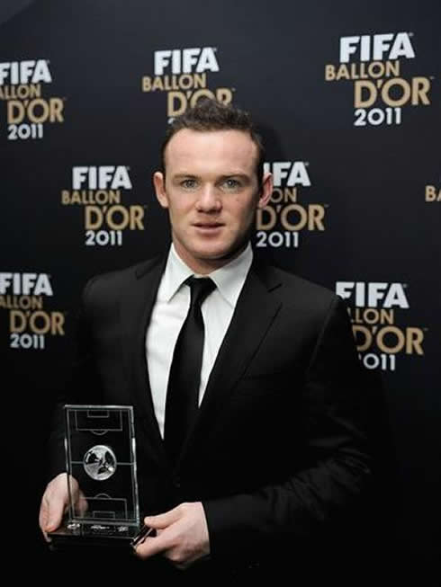 Wayne Rooney new grown hair, holding his award at the FIFA Balon d'Or 2011