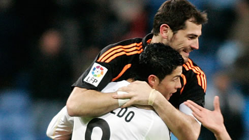 Iker Casillas jumping to Cristiano Ronaldo lap in a Real Madrid game