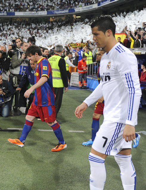 Cristiano Ronaldo and Lionel Messi entering the pitch at the Santiago Bernabéu, for a Real Madrid vs Barcelona Clasico, in 2011-2012