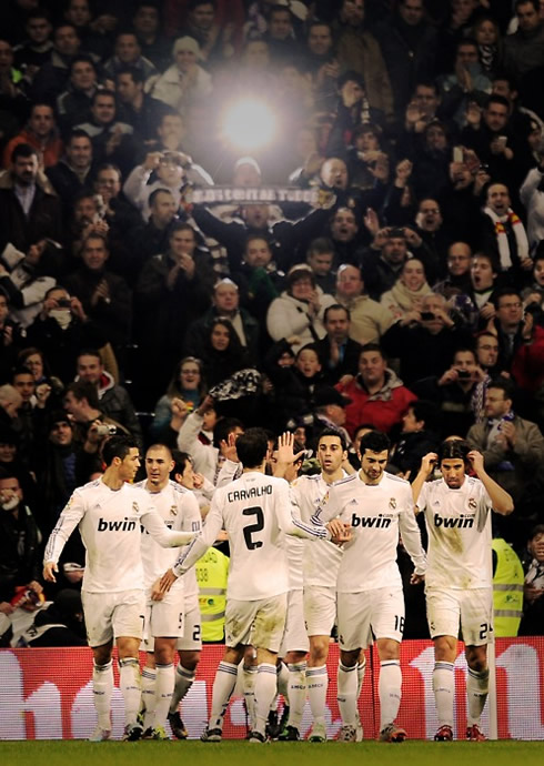 Cristiano Ronaldo and Real Madrid players celebrating with an over-crowded Santiago Bernabéu going crazy, in 2011-2012