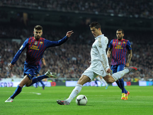 Cristiano Ronaldo goal for Real Madrid, making the 1-0 against Barcelona, with Piqué trying to block it, in the Copa del Rey 2011-2012