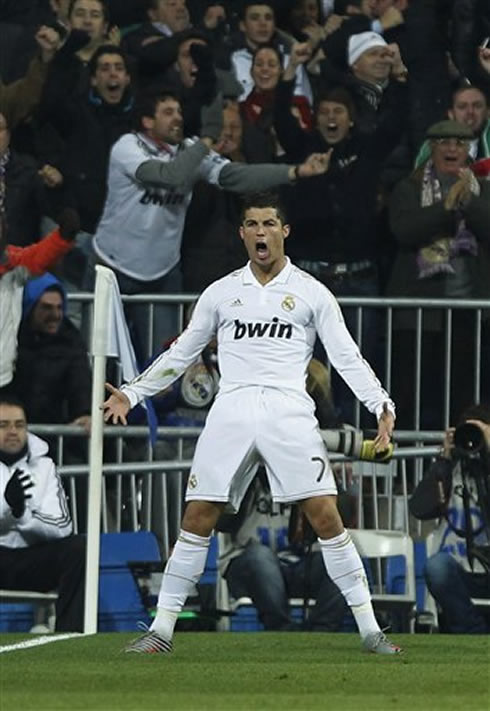 Cristiano Ronaldo standing celebration, at the Santiago Bernabéu, after scoring a goal against Barcelona, in 2012