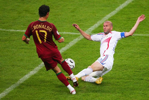 Cristiano Ronaldo dribbling Zinedine Zidane, who attempted to tackle him, in a Portugal vs France match