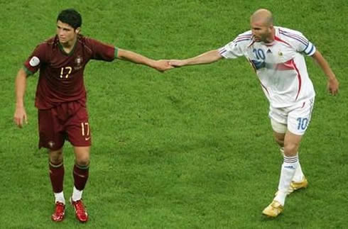 Cristiano Ronaldo and Zinedine Zidane touching hands, in Portugal vs France, for the World Cup 2006 played in Germany