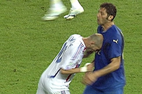 Zinedine Zidane head butting Marco Materazzi, and being shown the red card, in France vs Italy, for the World Cup 2006 Finals