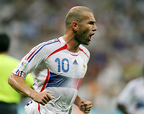 Zinedine Zidane playing for France, in a white Adidas jersey
