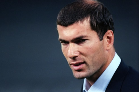 Zinedine Zidane still having hair and wearing a black suit