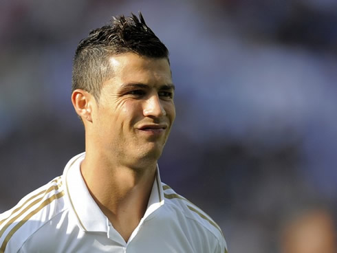 Cristiano Ronaldo making a funny, ugly and weird face expression, in Real Madrid 2012
