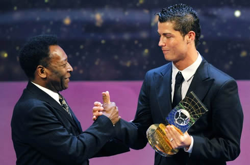 Cristiano Ronaldo being congratulated by Pelé, in the FIFA gala ceremony