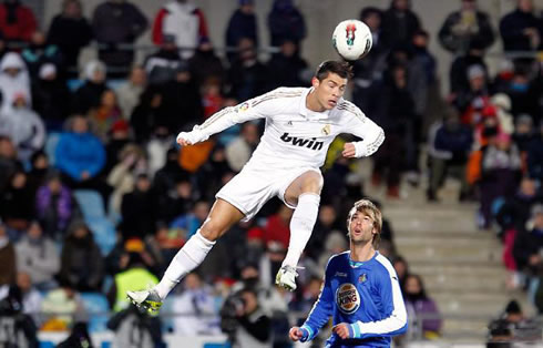 Cristiano Ronaldo rising in the air and heading the ball, in a game for Real Madrid in 2012