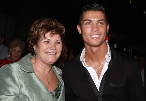 Cristiano Ronaldo taking a photo with his mother, Maria Dolores dos Santos Aveiro