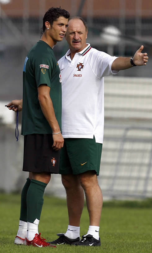 Cristiano Ronaldo listening to Felipe Scolari tactical instructions at a Portugal training session
