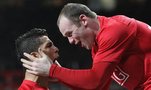 Cristiano Ronaldo and Wayne Rooney celebrating a goal for Manchester United