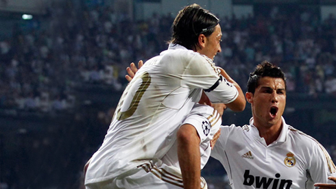 Cristiano Ronaldo, Mesut Ozil and Karim Benzema, in Real Madrid goal celebrations, in 2011-2012